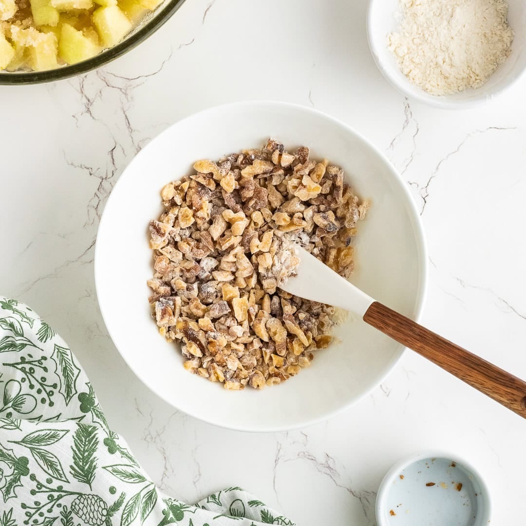 Nuts in a bowl with the flour.