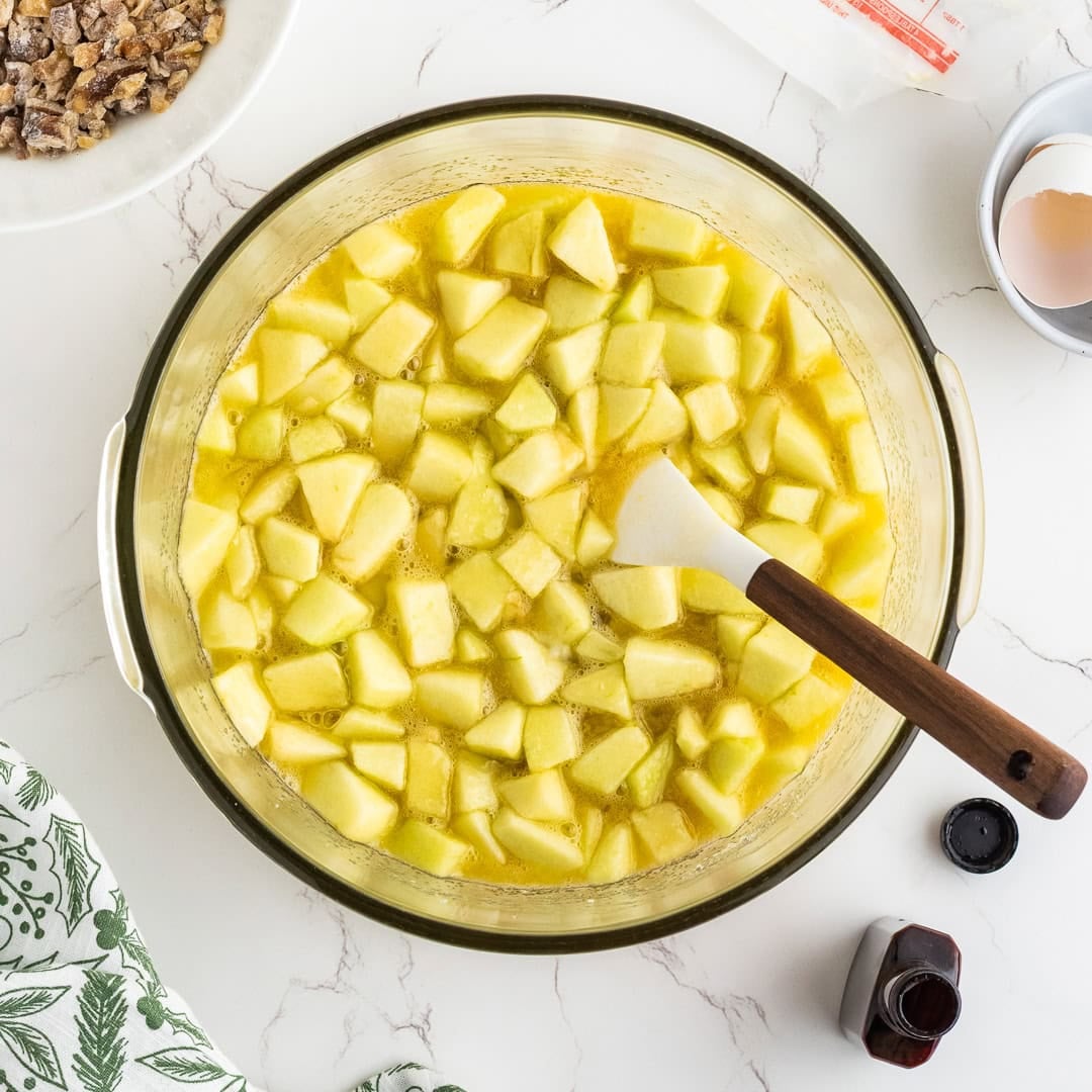Apples in a bowl with butter added.