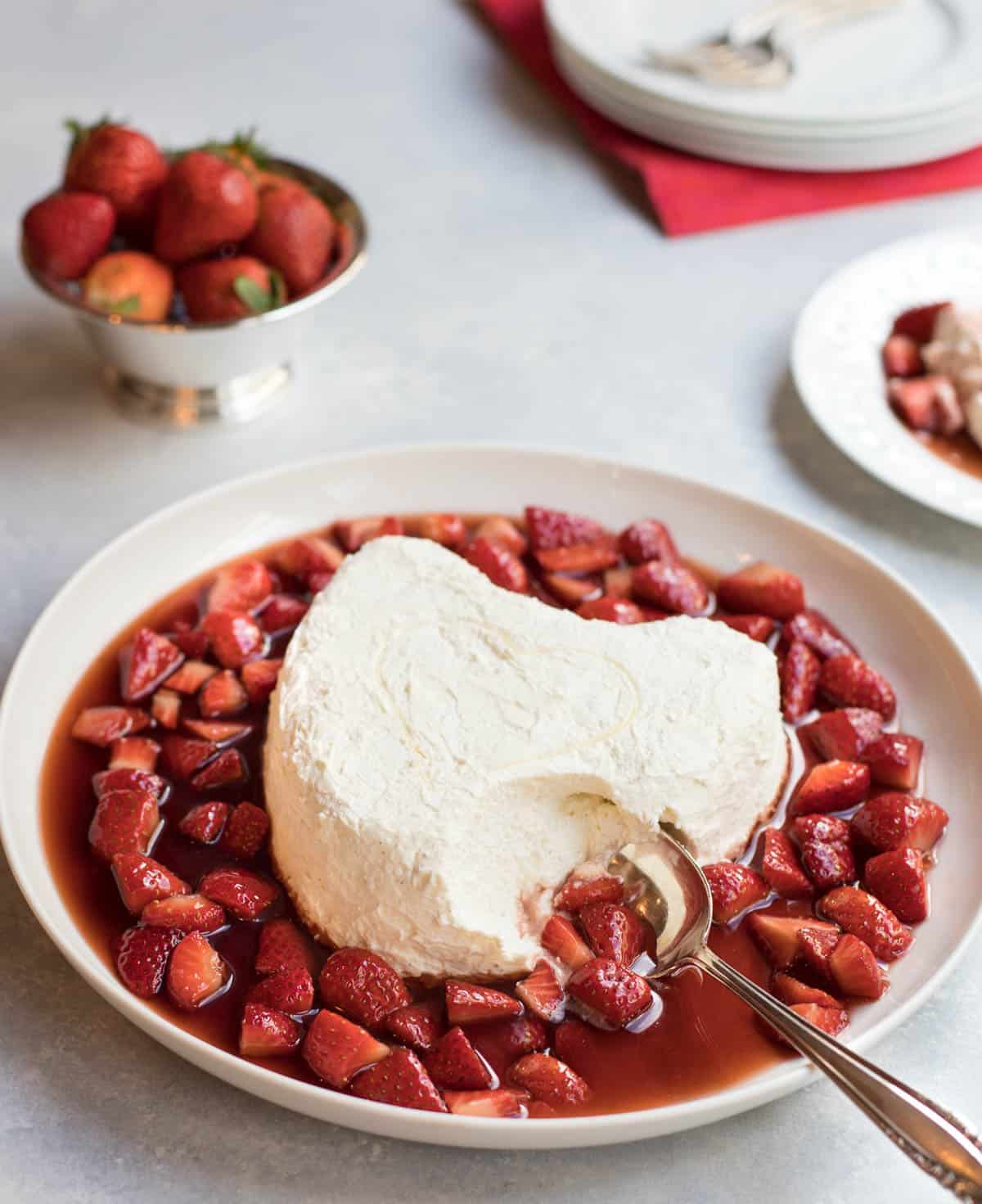 White platter filled with Coeur a la Cream with Strawberry Currant Sauce