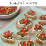 light green platter with Goat Cheese, Pesto and Tomato Crostini