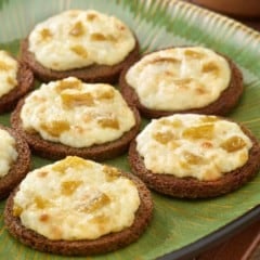 Light green platter filled with Green Chile Canapes