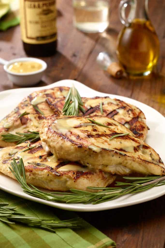 white plate with Grilled Rosemary-Dijon Chicken Breassts