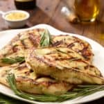 white plate with Grilled Rosemary-Dijon Chicken Breasts