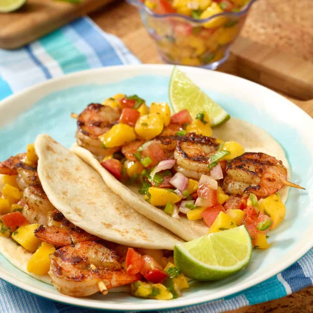 plate with two Grilled Shrimp Tacos with Tomato-Mango Salsa