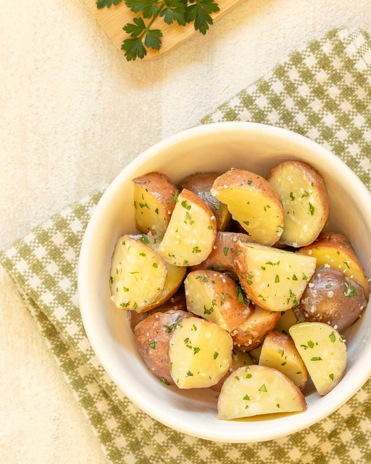 overhead shot of white bowl holding Instant Pot New Potatoes