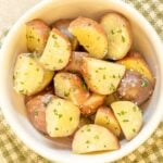 overhead shot of white bowl holding Instant Pot New Potatoes