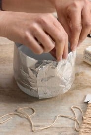 photo showing how to wrap foil around a souffle dish to make a collar