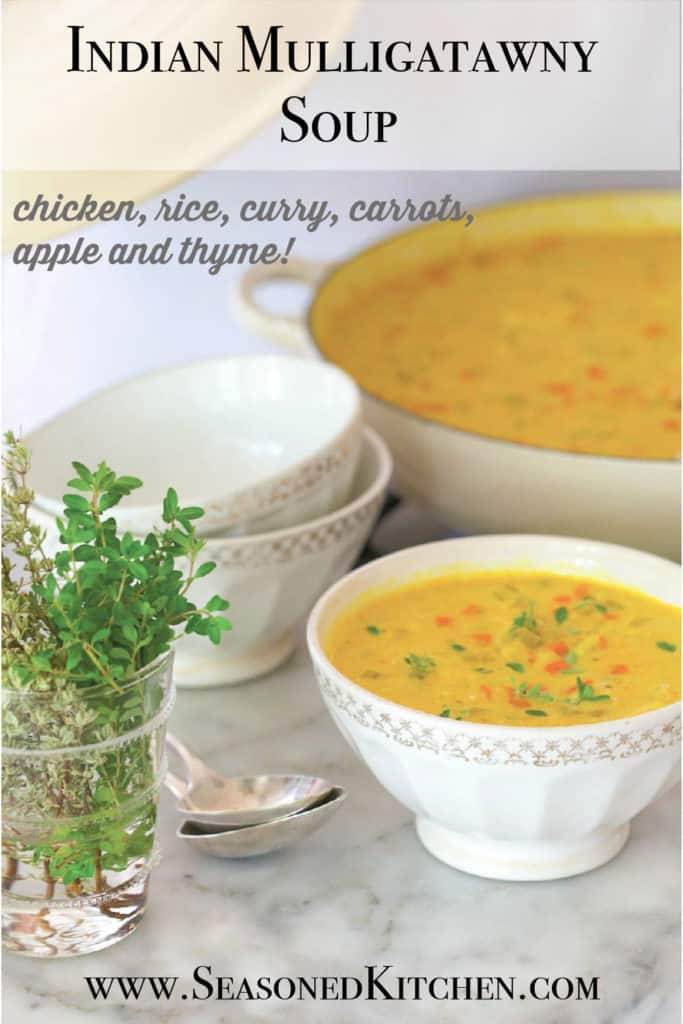 bowl of Mulligatawny Soup in front with a pot of soup in the background formatted for sharing