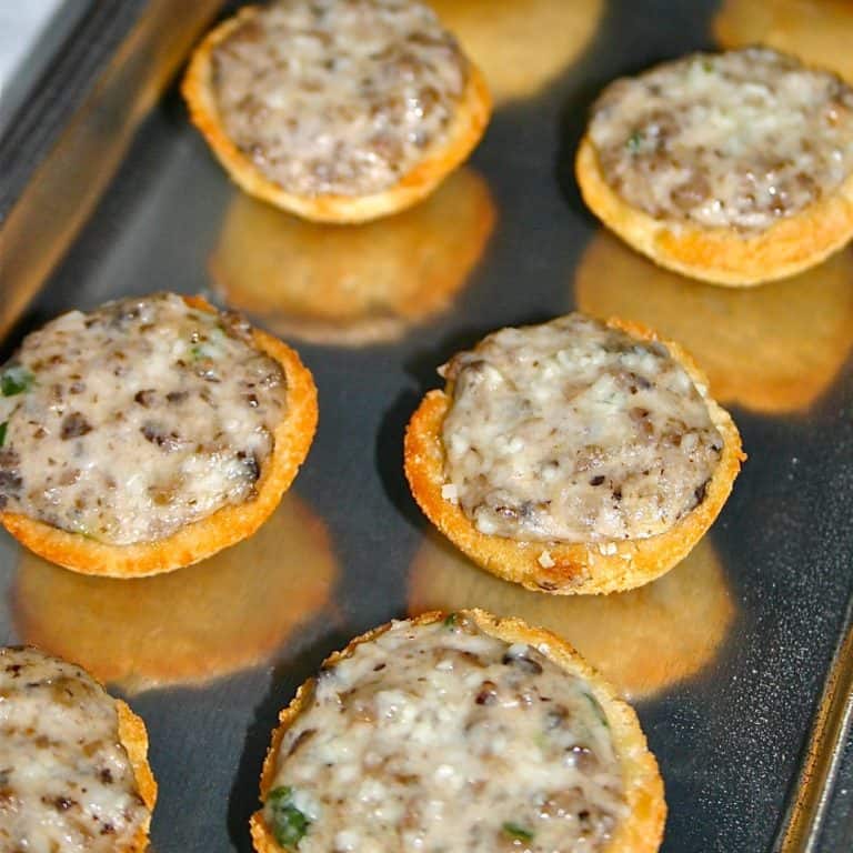 Mushroom and onion mixture in croustade on pewter platter