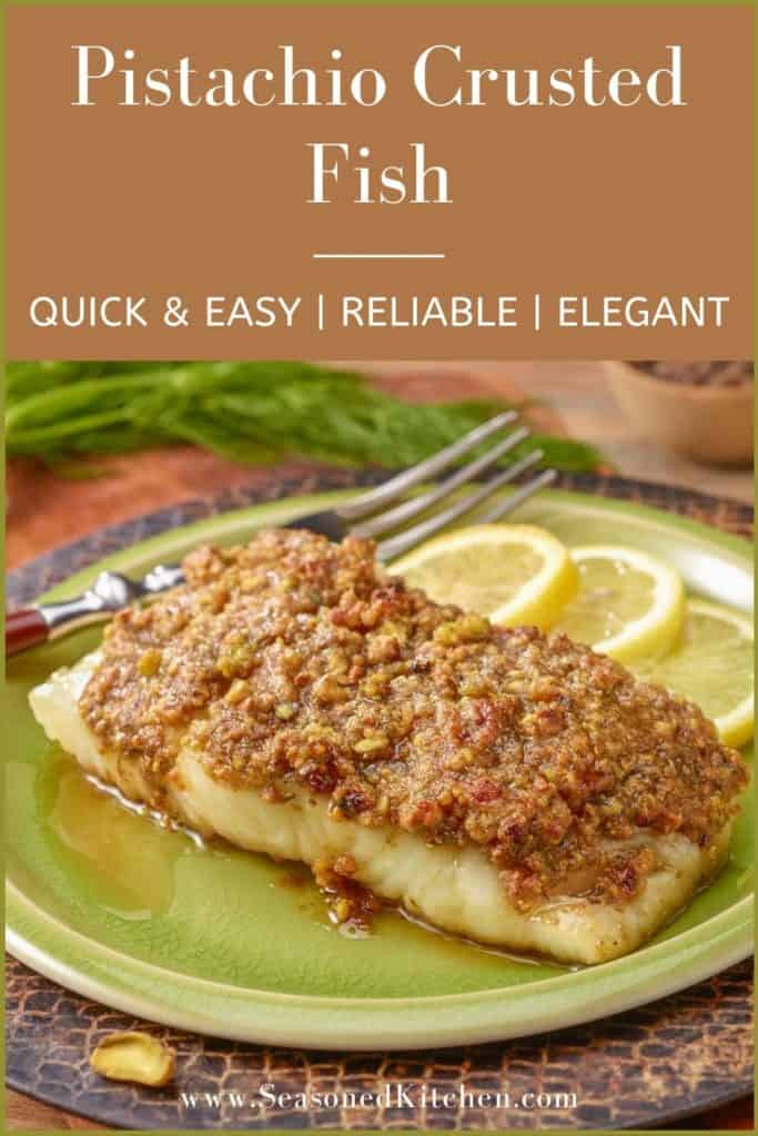 A single serving of Pistachio Crusted Fish, sitting on a light green plate that's on a cutting board. 
