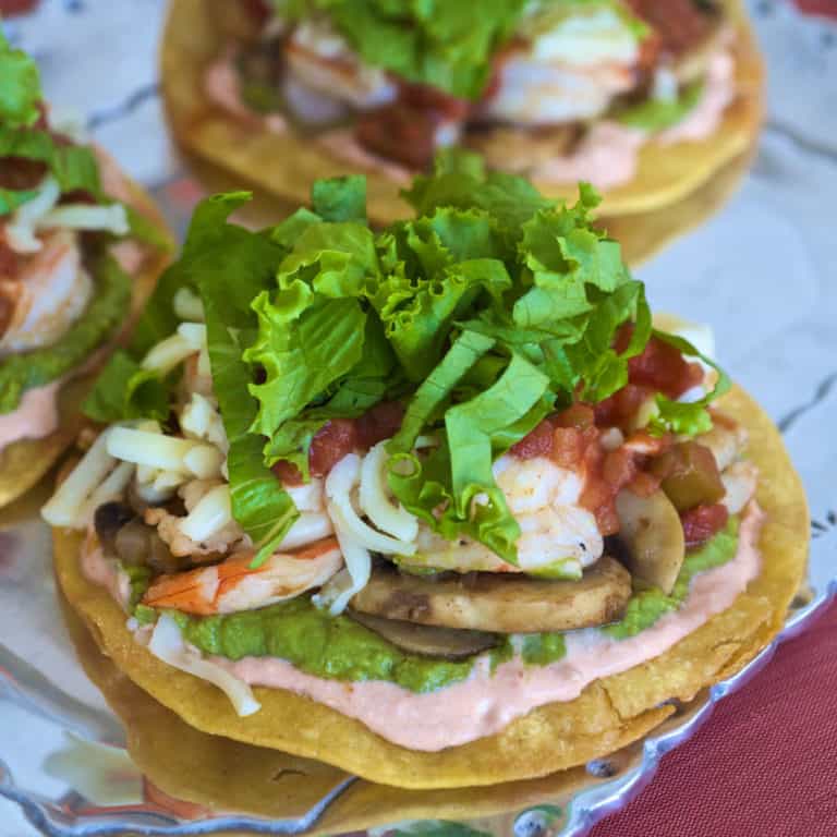 sauteed shrimp and vegetables atop crispy corn tortillas
