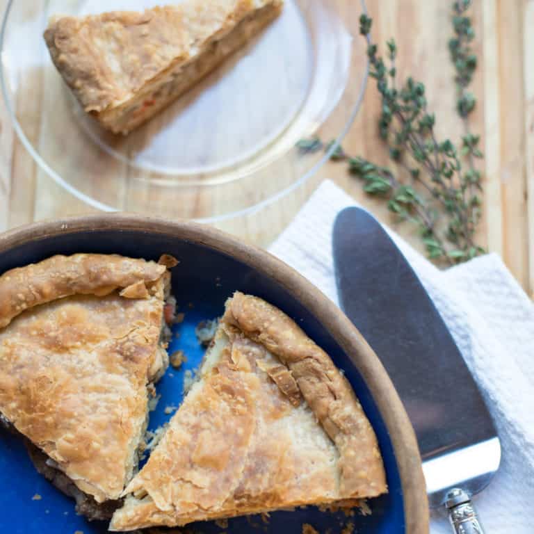 blue pie dish filled with Tourtiere
