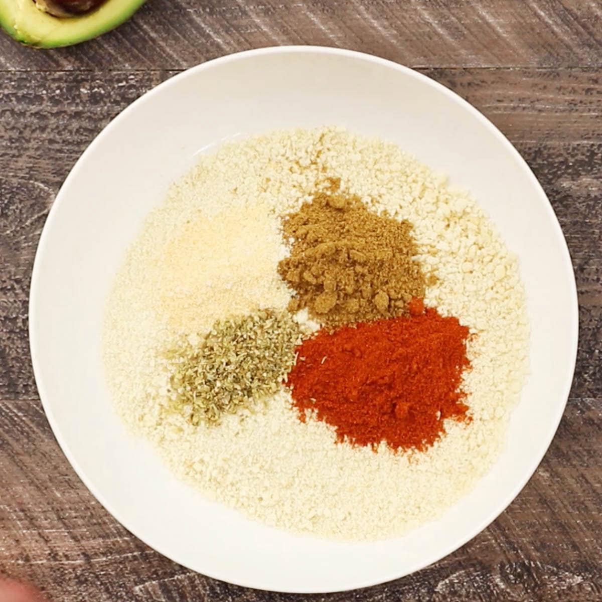 Panko breadcrumbs and seasonings in a bowl.