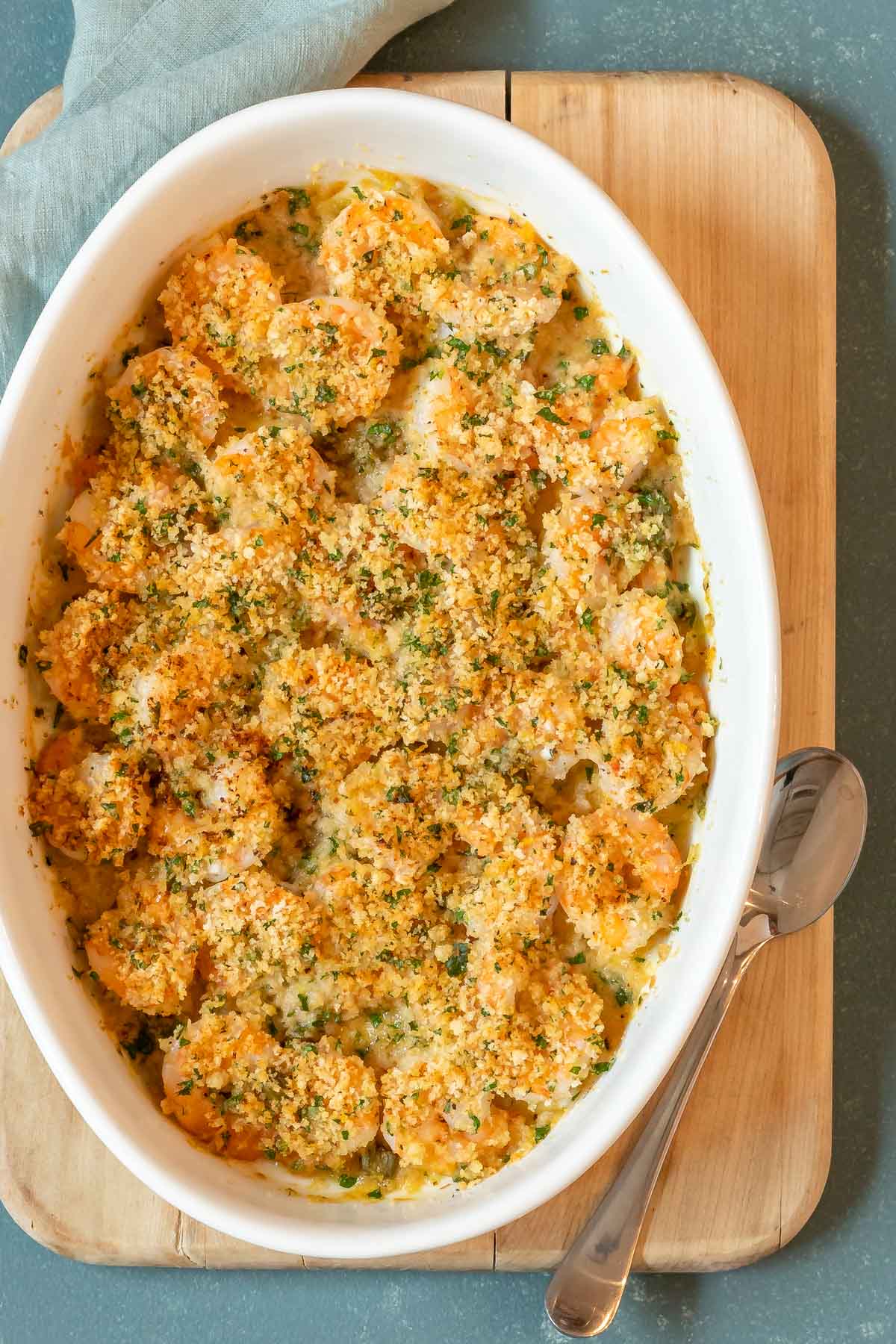 overhead view of Baked Shrimp Recipe, with a spoon alongside