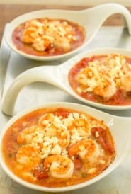 3 white small baking dishes holding Baked Shrimp with Tomatoes and Feta
