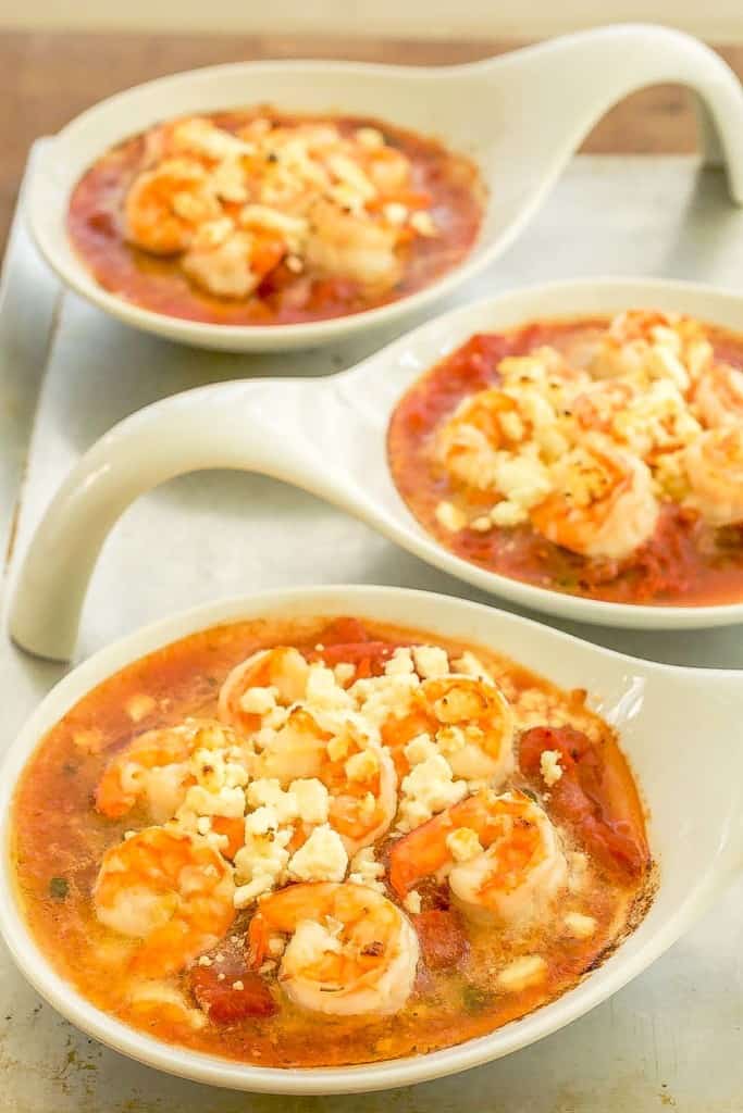 3 white small baking dishes holding Baked Shrimp with Tomatoes and Feta