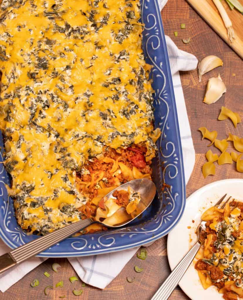 Blue dish filled with Beef, Spinach and Noodle Casserole