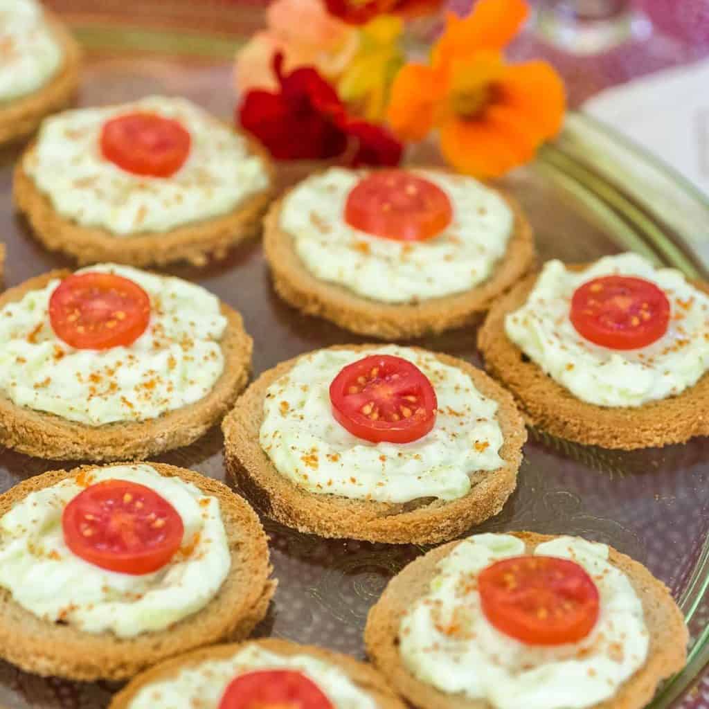 close up of Benedictine Cheese on toast rounds