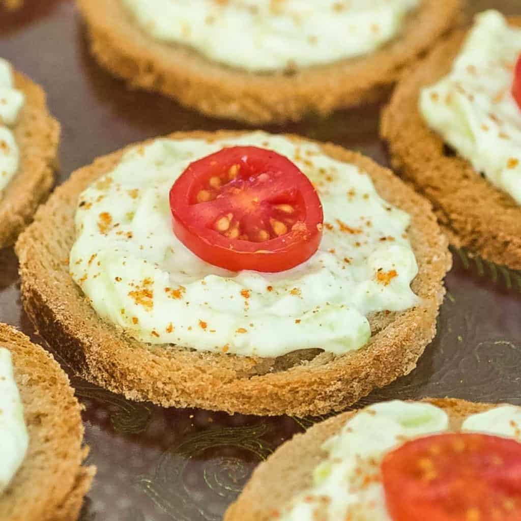 close up of a single Benedictine Cheese Canape