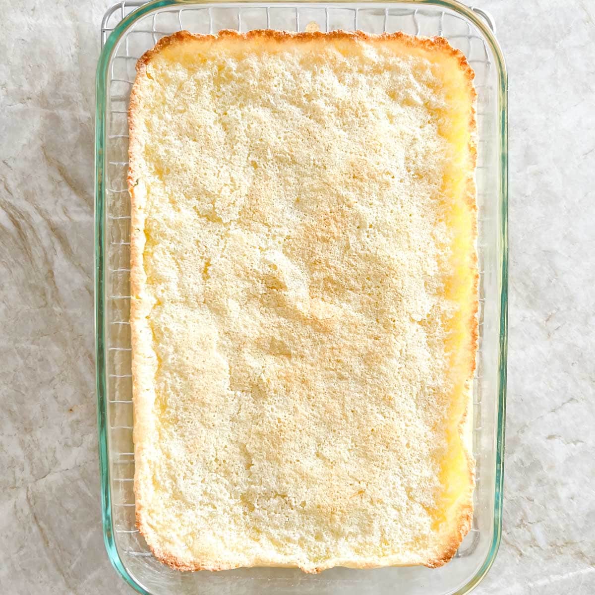 Cooked lemon bars, in baking dish before adding frosting