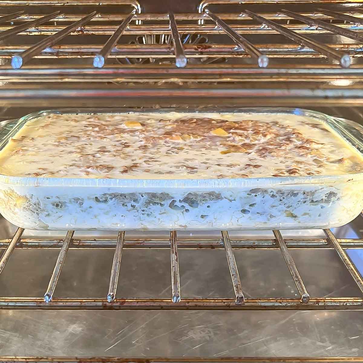Bobotie in oven for second round of baking