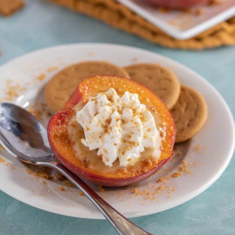 White plate holding one Butterscotch Pudding Filled Peach