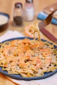 Blue plate filled with Quick and Easy Cajun Shrimp Linguine