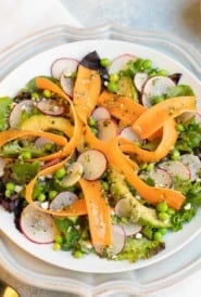 Shaved carrots, radishes, avocado, feta chees and lemon basil vinaigrette