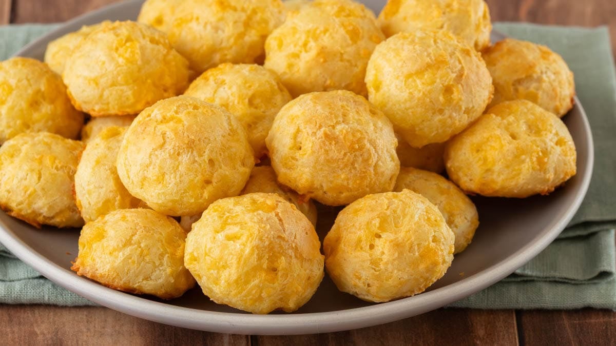Choux pastry baked into Cheddar gougères.