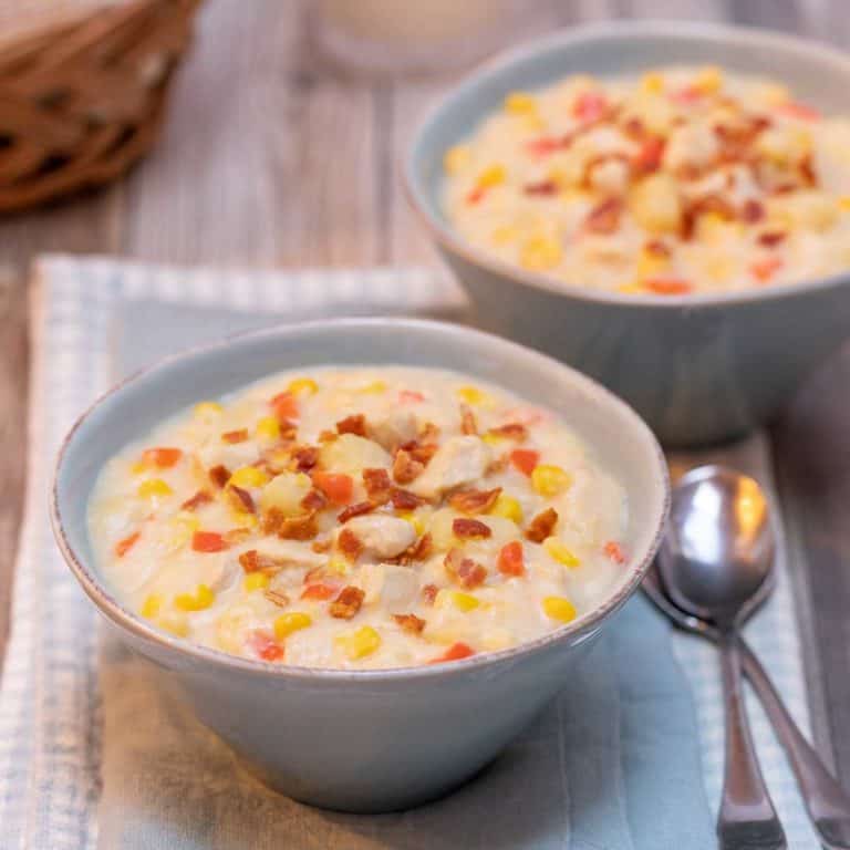 close up of two bowls filled with portions of Corn and Chicken Chowder