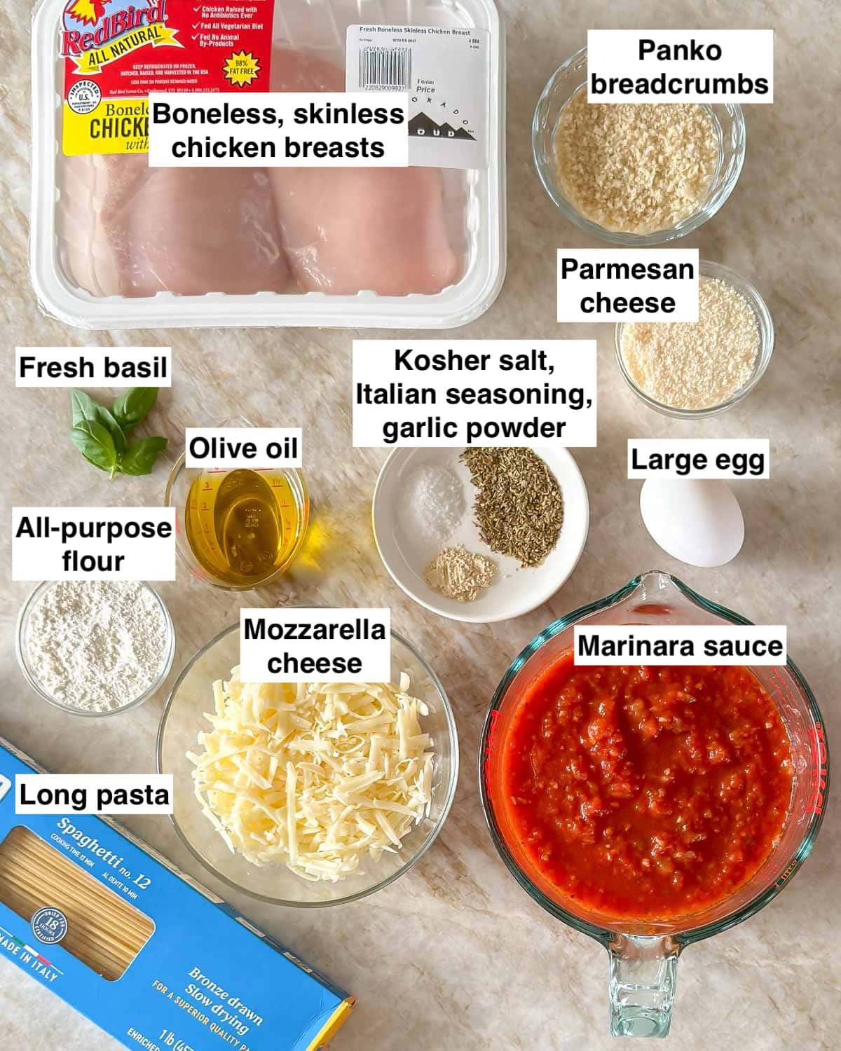 all the ingredients needed to prepare Chicken Parmesan.