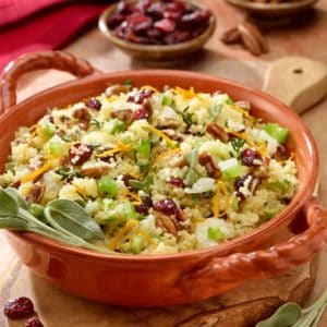 oval dish showing Couscous with cranberries and pecans