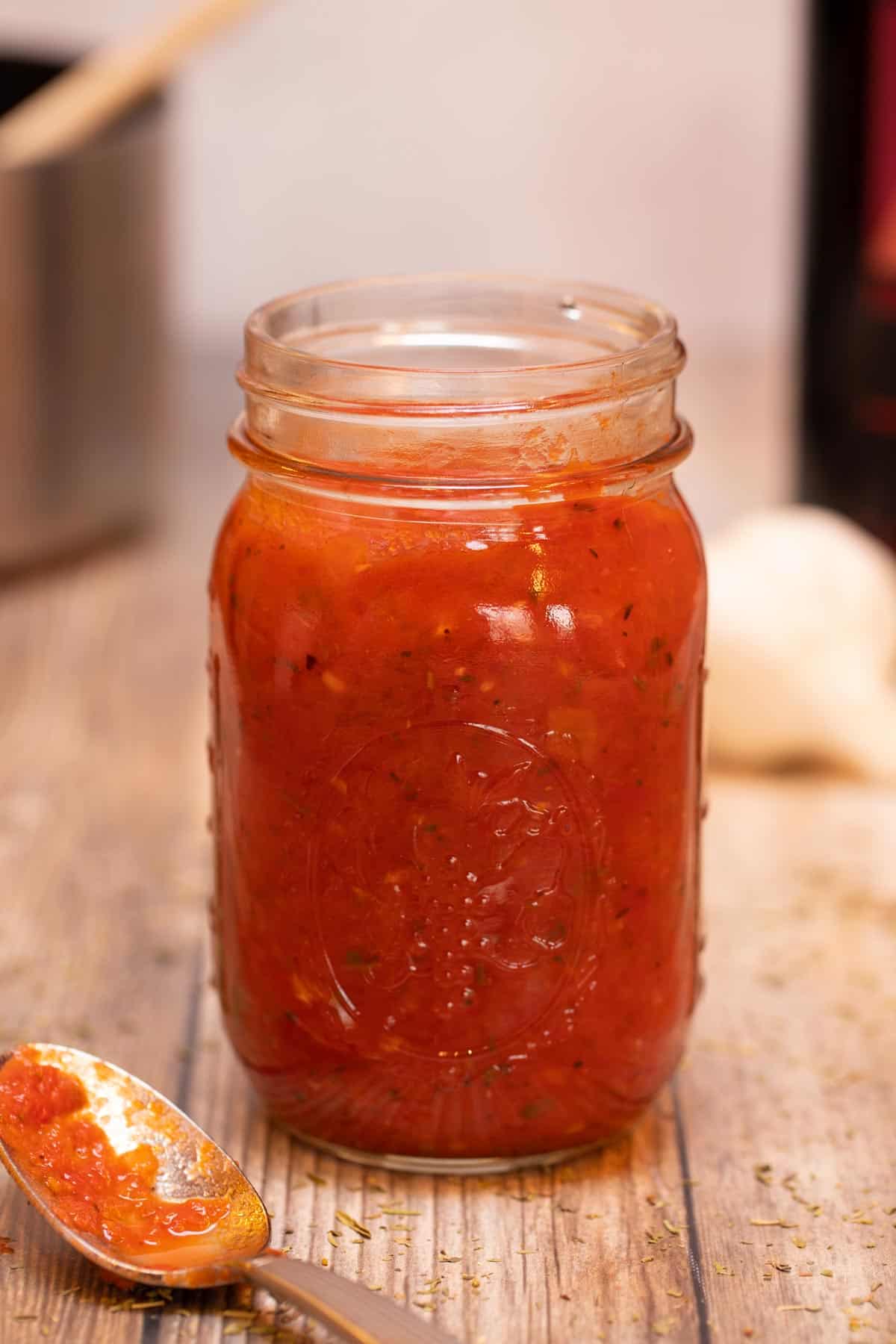 clear jar filled with Easy Marinara Sauce