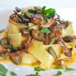 White plate with a large portion of Quick Eggplant and Mushroom Pappardelle.