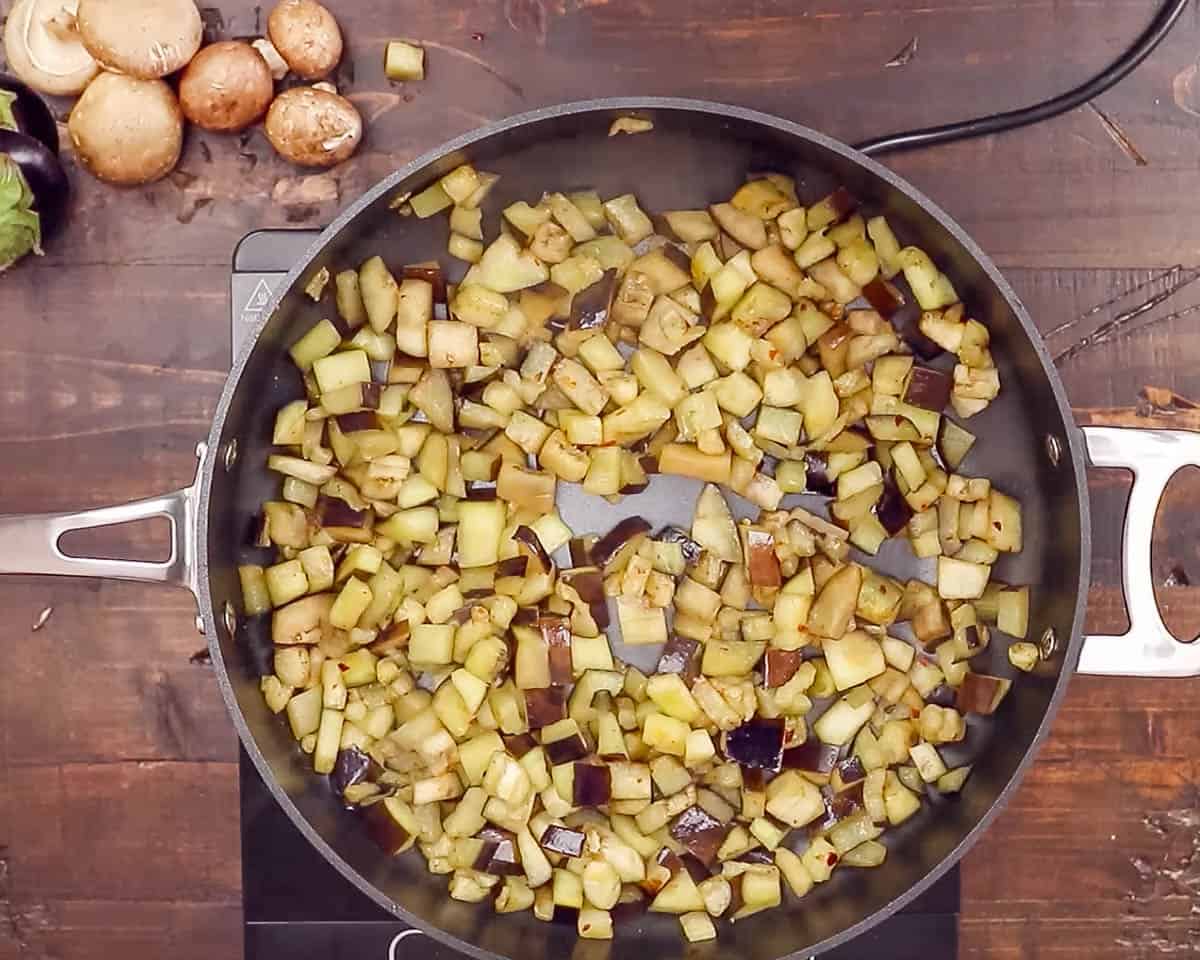 Overhead view of eggplant cooking