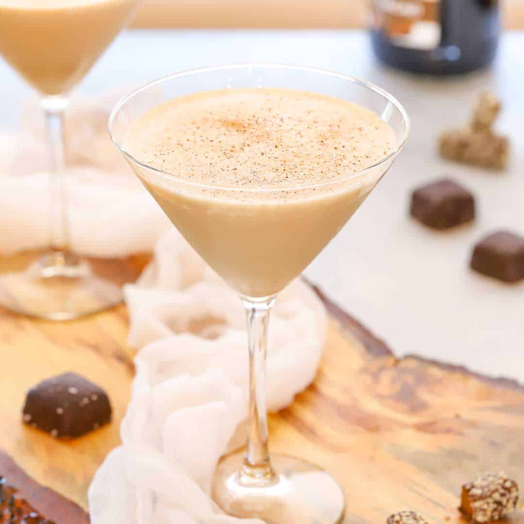 close up of a martini glass holding a Frozen Brandy Alexander cocktail.