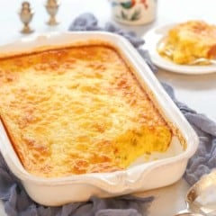 large white casserole dish holding Green Chile Casserole