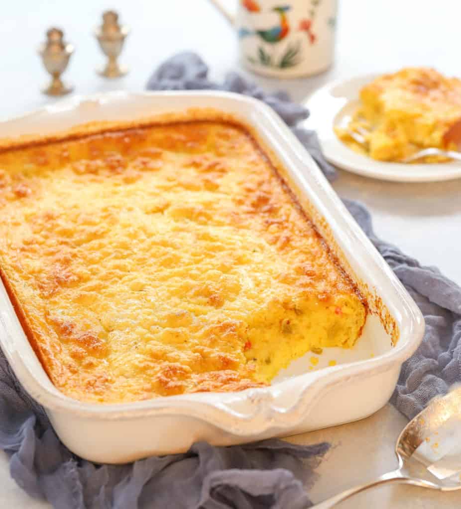 large white casserole dish holding Green Chile Casserole