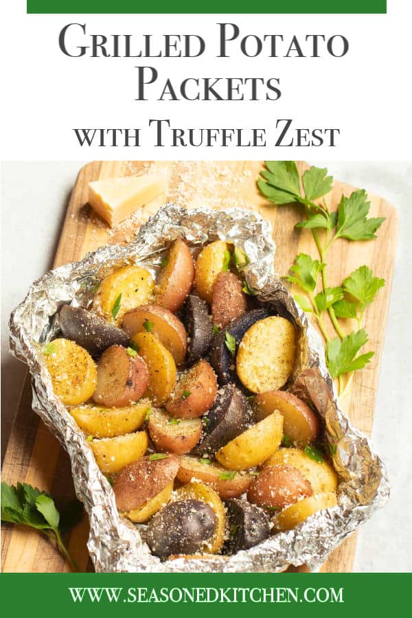 Foil packet filled with grilled new potatoes, seasoned with Parmesan Cheese, parsley and truffle zest.