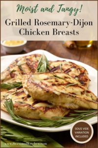White plate filled with Grilled Rosemary DIjon Chicken Breasts