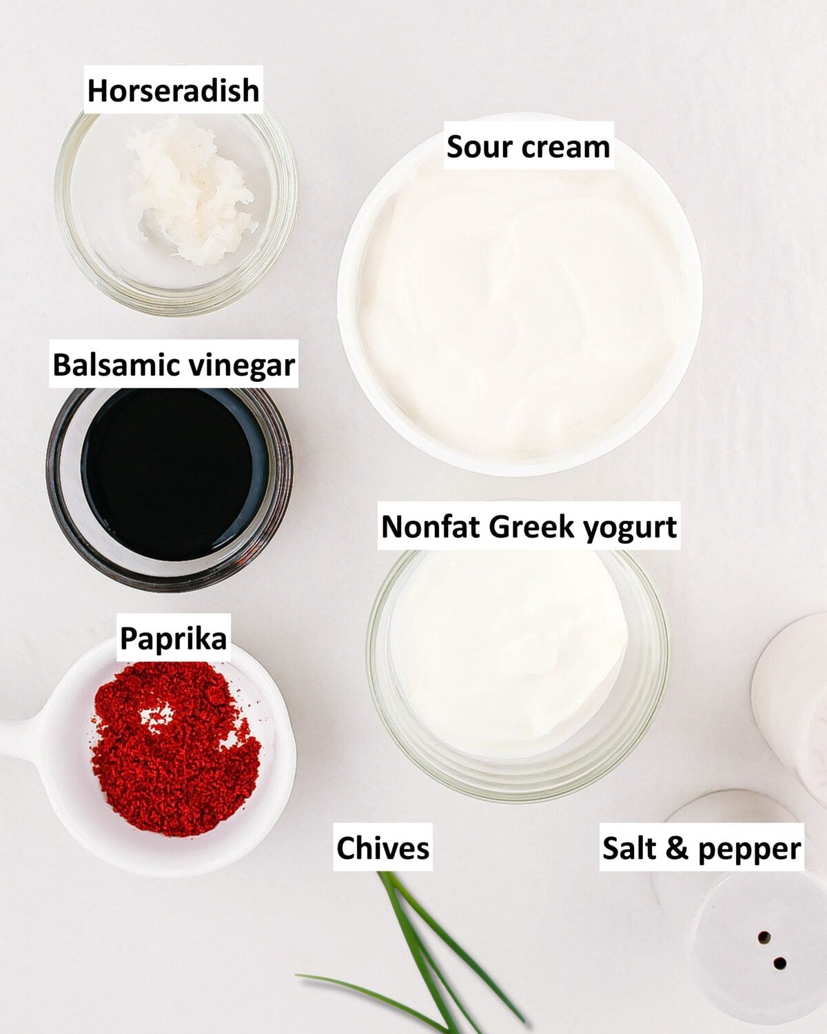 Ingredients to make creamy horseradish dressing for a grilled steak salad.