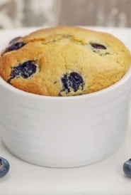 white ramekin filled with Individual Blueberry Cake