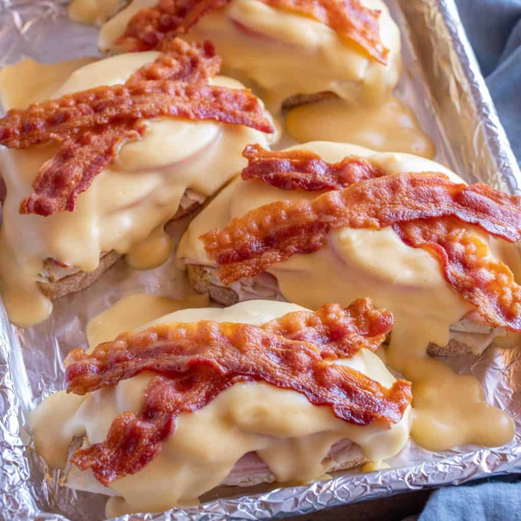 close up shot of 4 Kentucky Hot Browns on a foil lined pan