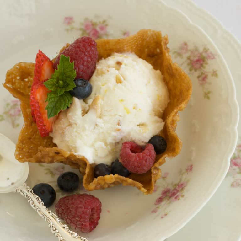 Pecan Cookie Cup with a scoop of Lemon Almond Ice Cream with berries
