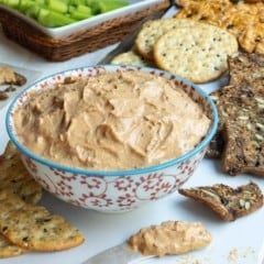 Red and white bowl filled with Liptauer Cheese Spread