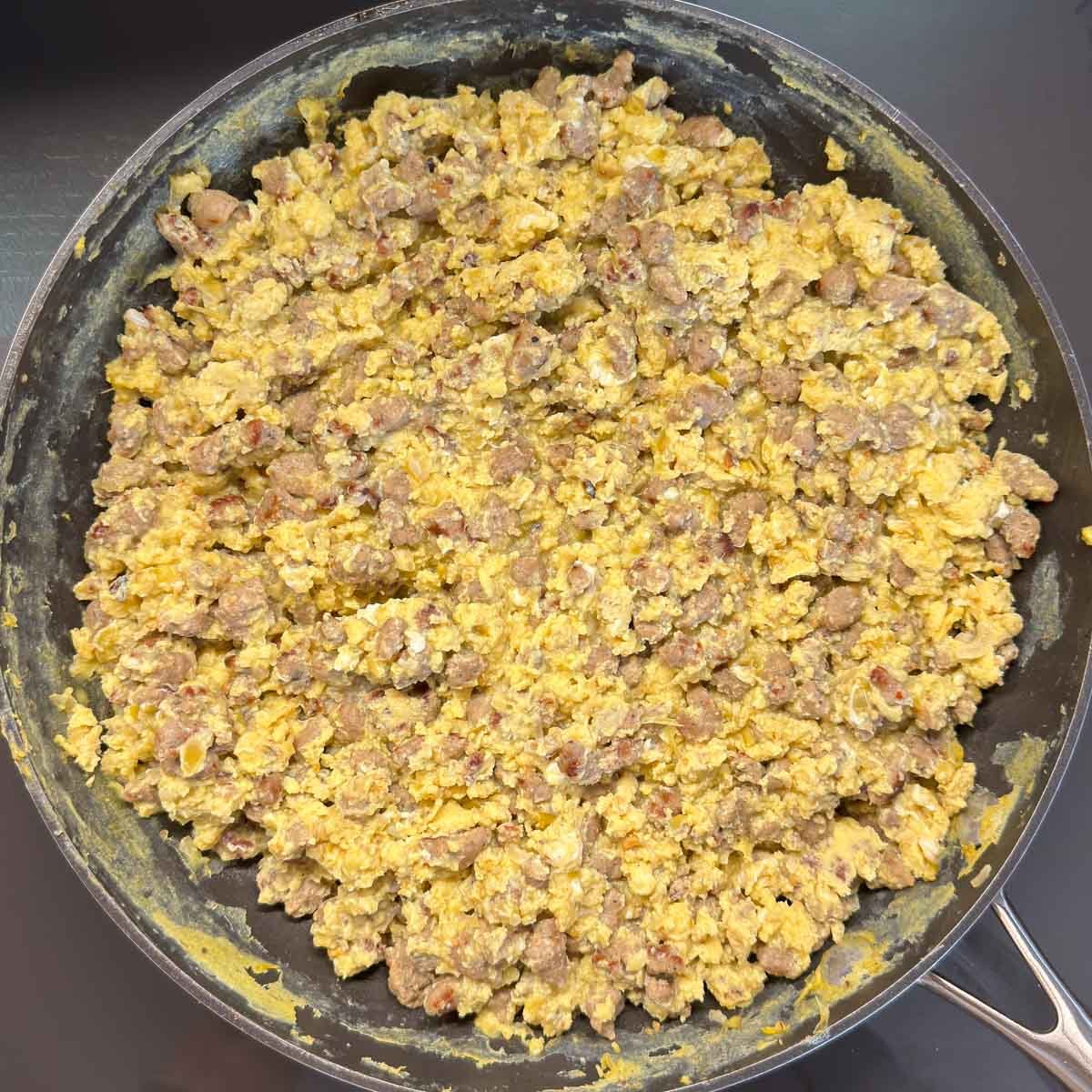 Turkey sausage crumbles and eggs cooked so no longer wet.