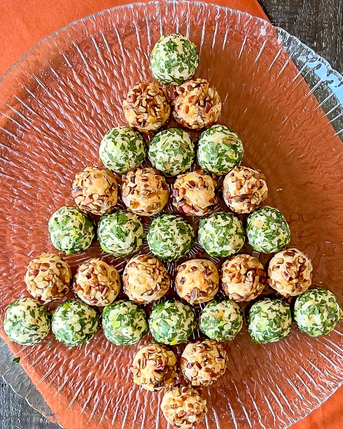 Both kinds of cheese truffles arranged in the shape of a tree