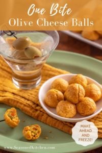 Green platter underneath a yellow napkin, martini and small bowl of Olive Cheese Balls