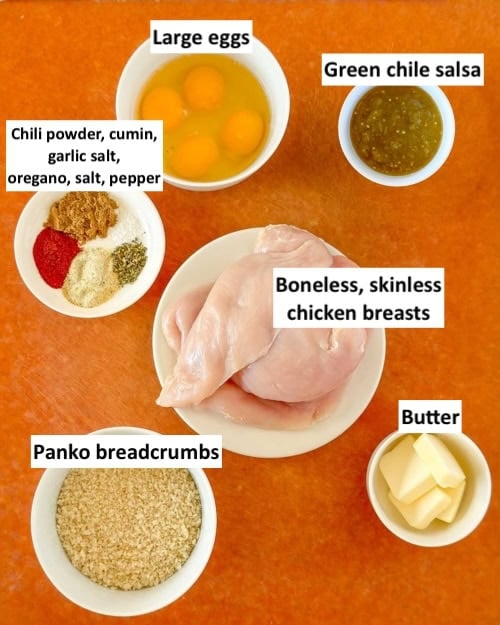 Ingredients to make the chicken on a countertop and labeled to identify each one. 