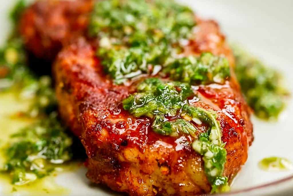 Spicy Pork Chop topped with Chimichurri Sauce